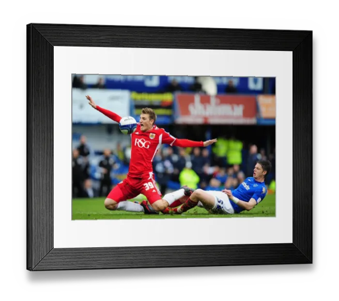 Framed Print : Chris Wood Foul by Greg Halford: Portsmouth vs. Bristol City Football Match, 17th March 2012