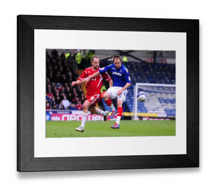 Framed Print : Battling for Supremacy: Carey vs. Varney in Portsmouth vs. Bristol City Football Match, 2012