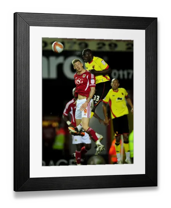Framed Print : Battling for Supremacy: Jon Stead vs. Nyron Nosworthy in the 2012 Bristol City vs. Watford Football Match Framed Print : Battling for Supremacy: Jon Stead vs. Nyron Nosworthy in the 2012 Bristol City vs. Watford Football Match