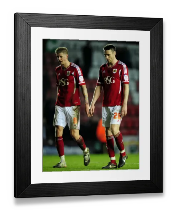 Framed Print : Dejected Duo: McManus and Stead Leave Ashton Gate After Bristol City's Loss to Watford Framed Print : Dejected Duo: McManus and Stead Leave Ashton Gate After Bristol City's Loss to Watford