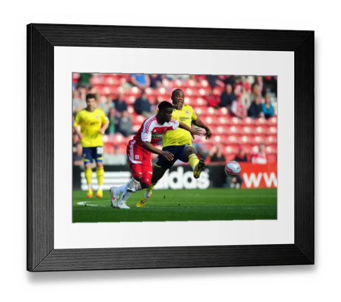 Framed Print : Battling for Supremacy: Ogbeche vs. Amougou in the Middlesbrough vs. Bristol City Clash Framed Print : Battling for Supremacy: Ogbeche vs. Amougou in the Middlesbrough vs. Bristol City Clash