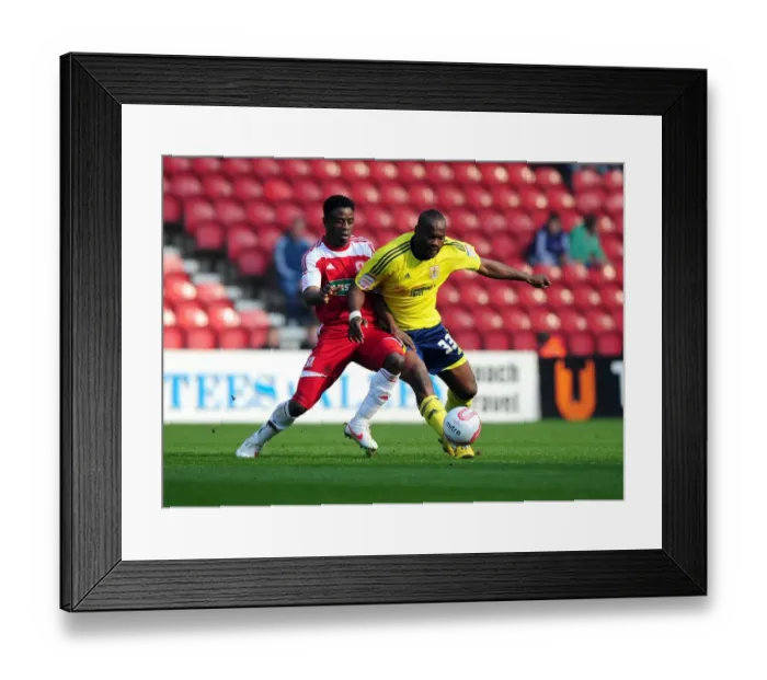 Framed Print : Battling for Control: Ogbeche vs. Amougou in the Intense Middlesbrough vs. Bristol City Clash Framed Print : Battling for Control: Ogbeche vs. Amougou in the Intense Middlesbrough vs. Bristol City Clash