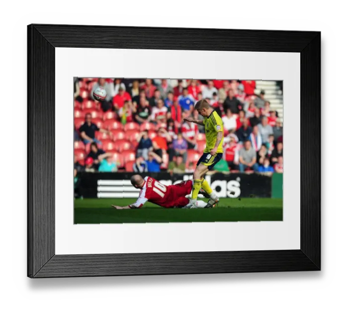Framed Print : Middlesbrough's Nicky Bailey Tackles Jon Stead of Bristol City - Football Rivalry at Riverside Stadium (March 2012) Framed Print : Middlesbrough's Nicky Bailey Tackles Jon Stead of Bristol City - Football Rivalry at Riverside Stadium (March 2012)