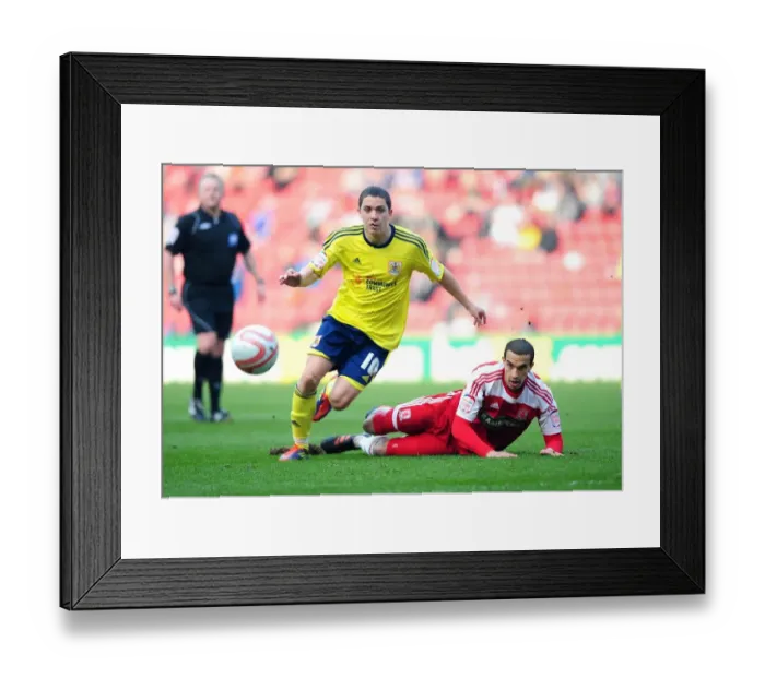 Framed Print : Bristol City's Hogan Ephraim Fights for Possession against Middlesbrough's Seb Hines during Riverside Stadium Clash, 2012