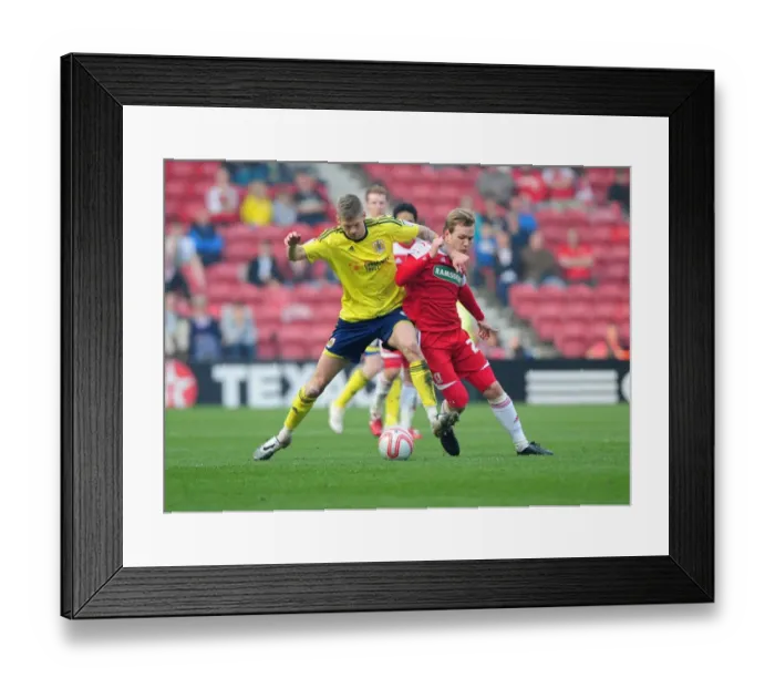 Framed Print : Bristol City's Jon Stead vs. Middlesbrough's Malaury Martin: A Battle for the Ball at Riverside Stadium, 2012 Framed Print : Bristol City's Jon Stead vs. Middlesbrough's Malaury Martin: A Battle for the Ball at Riverside Stadium, 2012