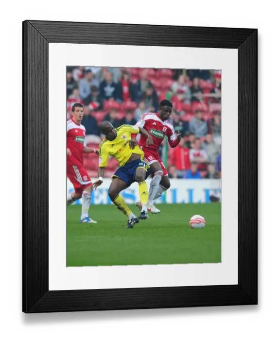 Framed Print : Bristol City's Kalifa Cisse vs. Middlesbrough's Barthomew Ogbeche: A Battle for Supremacy on the Riverside Stadium Field (Middlesbrough v Bristol City, 2012) Framed Print : Bristol City's Kalifa Cisse vs. Middlesbrough's Barthomew Ogbeche: A Battle for Supremacy on the Riverside Stadium Field (Middlesbrough v Bristol City, 2012)