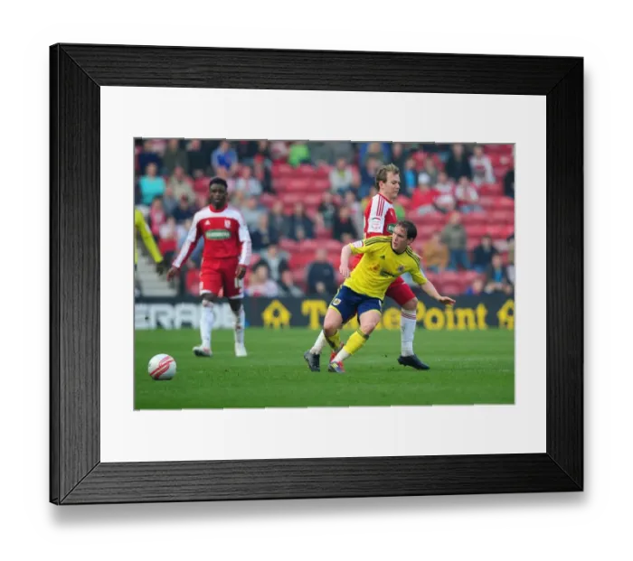 Framed Print : Neil Kilkenny of Bristol City Spreads Play at Riverside Stadium during Middlesbrough vs. Bristol City Football Match, March 2012 Framed Print : Neil Kilkenny of Bristol City Spreads Play at Riverside Stadium during Middlesbrough vs. Bristol City Football Match, March 2012