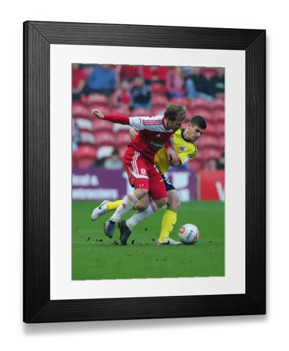 Framed Print : Battling for Supremacy: Edwards vs. Martin at Riverside Stadium - Middlesbrough vs. Bristol City Football Match, 2012 Framed Print : Battling for Supremacy: Edwards vs. Martin at Riverside Stadium - Middlesbrough vs. Bristol City Football Match, 2012