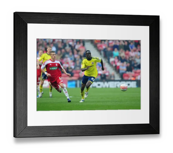Framed Print : Adomah Sprints Ahead: Thrilling Moment from Middlesbrough vs. Bristol City Football Match, 24 / 03 / 2012