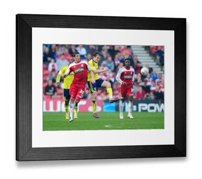 Framed Print : Neil Kilkenny vs. Lukas Jutkiewicz: Battle for the Ball in Middlesbrough vs. Bristol City Football Match, March 2012 Framed Print : Neil Kilkenny vs. Lukas Jutkiewicz: Battle for the Ball in Middlesbrough vs. Bristol City Football Match, March 2012