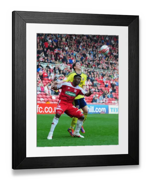 Framed Print : Battling for Supremacy: Hogan Ephraim vs. Barthomew Ogbeche in Middlesbrough vs. Bristol City Football Match, 2012 Framed Print : Battling for Supremacy: Hogan Ephraim vs. Barthomew Ogbeche in Middlesbrough vs. Bristol City Football Match, 2012