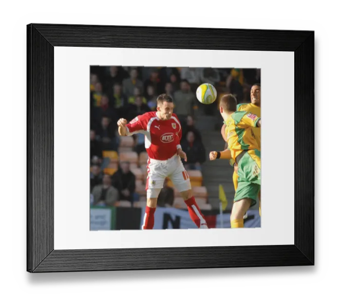 Framed Print : Football Rivalry: Michael McIndoe in Action - Norwich City vs. Bristol City