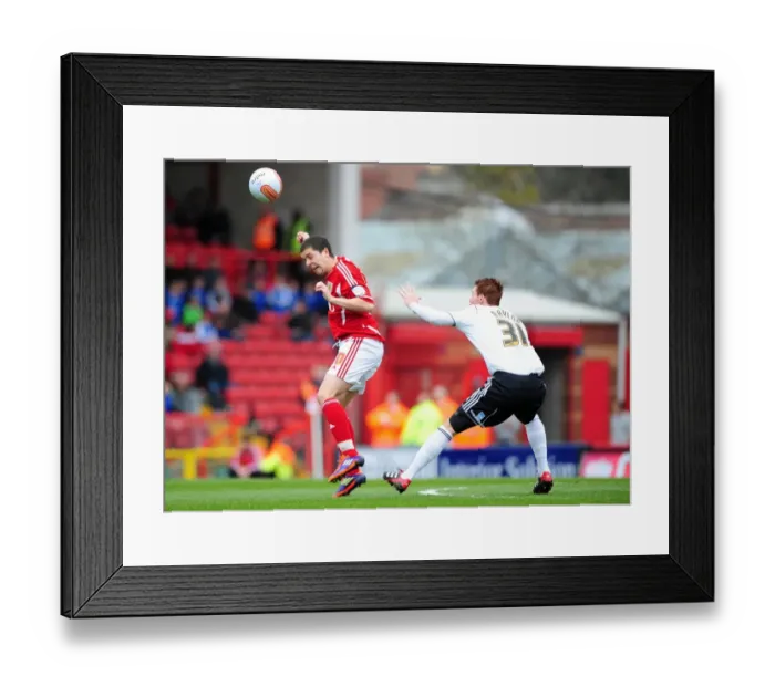 Framed Print : Bristol City vs Derby County: Aerial Battle between Hogan Ephraim and Tom Naylor at Ashton Gate Stadium, 2012 Framed Print : Bristol City vs Derby County: Aerial Battle between Hogan Ephraim and Tom Naylor at Ashton Gate Stadium, 2012