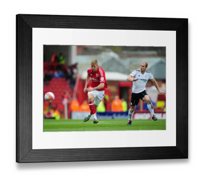 Framed Print : Bristol City vs Derby County: Jon Stead vs Paul Green Battle for Possession at Ashton Gate Stadium, 2012