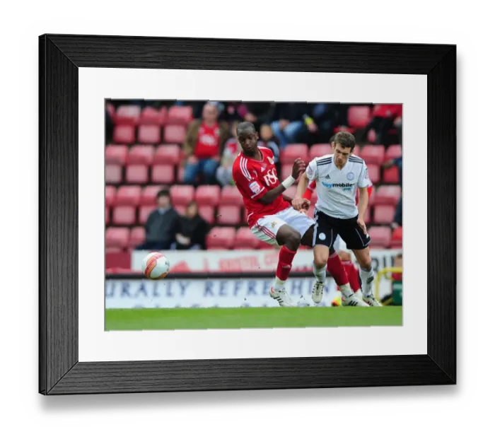 Framed Print : Bristol City vs Derby County: Kalifa Cisse Fights for Ball at Ashton Gate Stadium Framed Print : Bristol City vs Derby County: Kalifa Cisse Fights for Ball at Ashton Gate Stadium