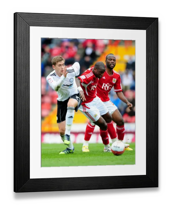 Framed Print : Intense Rivalry: Cisse vs. Davies Clash in Bristol City vs. Derby County Football Match Framed Print : Intense Rivalry: Cisse vs. Davies Clash in Bristol City vs. Derby County Football Match