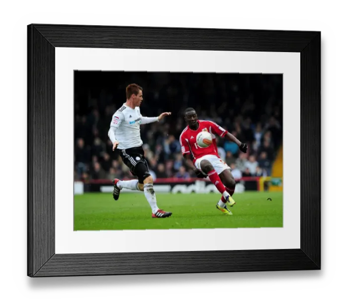 Framed Print : Bristol City vs Derby County: Yannick Bolasie and Tom Naylor Clash in Intense Football Match at Ashton Gate Stadium (March 2012) Framed Print : Bristol City vs Derby County: Yannick Bolasie and Tom Naylor Clash in Intense Football Match at Ashton Gate Stadium (March 2012)
