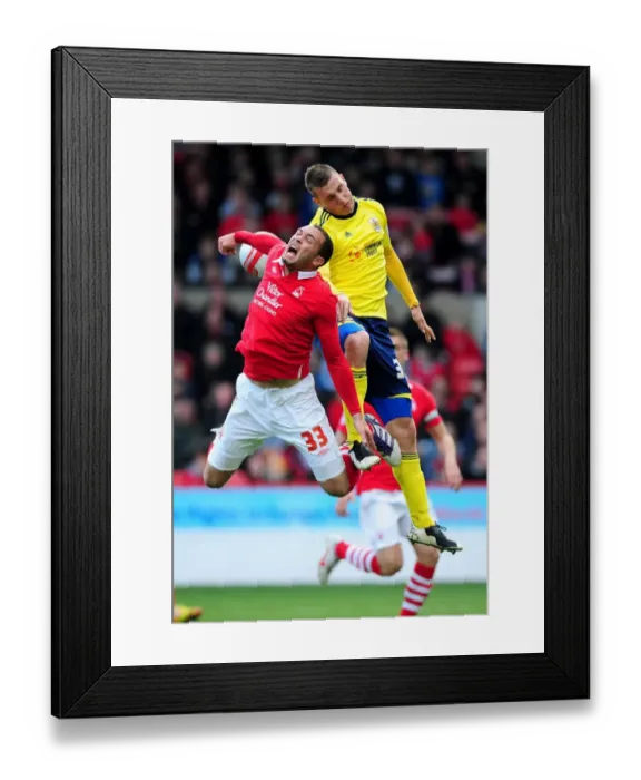 Framed Print : Chris Wood vs. Joel Lynch: Battle for Supremacy in Nottingham Forest vs. Bristol City Football Match, April 2012