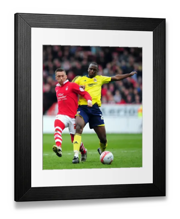 Framed Print : Battling for Supremacy: Cisse vs. Majewski in Nottingham Forest vs. Bristol City Clash