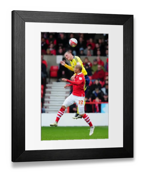 Framed Print : Chris Wood vs Adlene Guedioura: Battle for Supremacy in Nottingham Forest vs Bristol City Football Match, April 2012