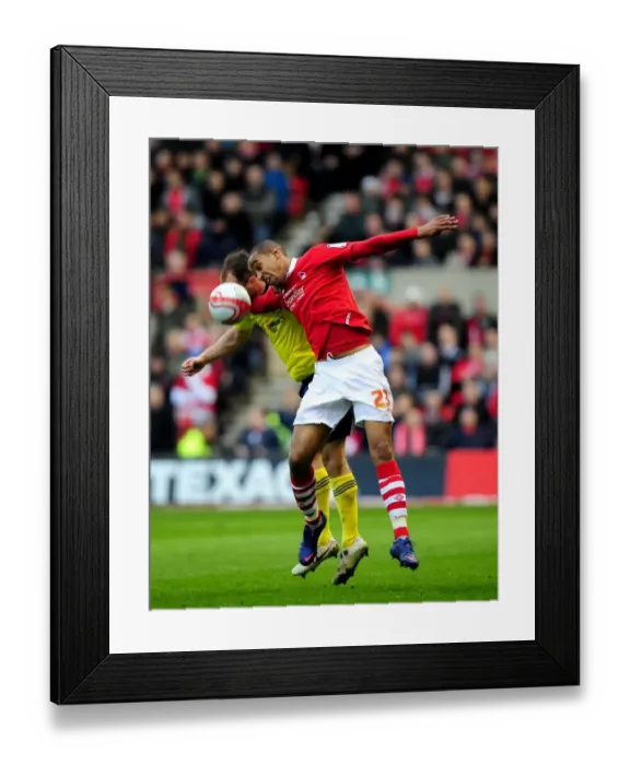 Framed Print : Battling for Supremacy: Louis Carey vs. Dexter Blackstock in Nottingham Forest vs. Bristol City Football Match, 07-04-2012 Framed Print : Battling for Supremacy: Louis Carey vs. Dexter Blackstock in Nottingham Forest vs. Bristol City Football Match, 07-04-2012