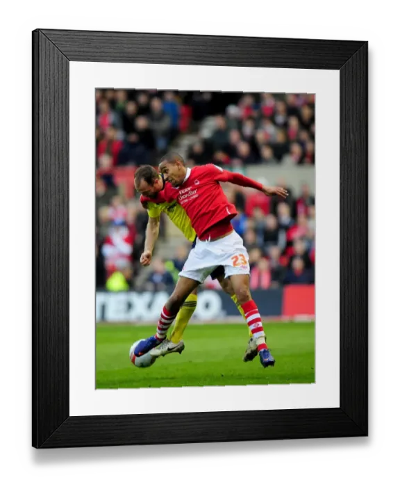 Framed Print : Battling for the Ball: Louis Carey vs. Dexter Blackstock - Nottingham Forest vs. Bristol City Football Rivalry, 07 / 04 / 2012