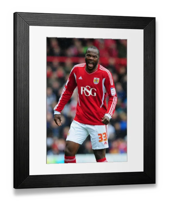 Framed Print : Thrilling Moments: Andre Amougou in Action for Bristol City vs Coventry City (April 9, 2012)