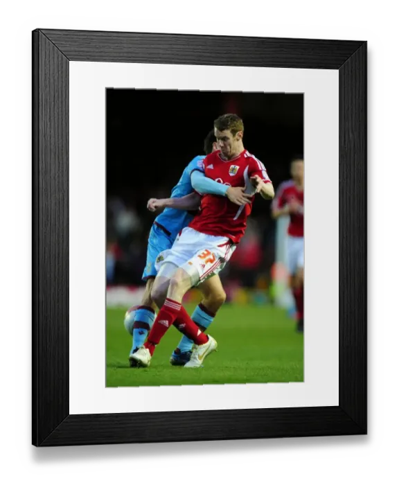 Framed Print : Pearson vs. Noble: Intense Rivalry on the Field at Ashton Gate Stadium - Bristol City vs. West Ham Football Match Framed Print : Pearson vs. Noble: Intense Rivalry on the Field at Ashton Gate Stadium - Bristol City vs. West Ham Football Match