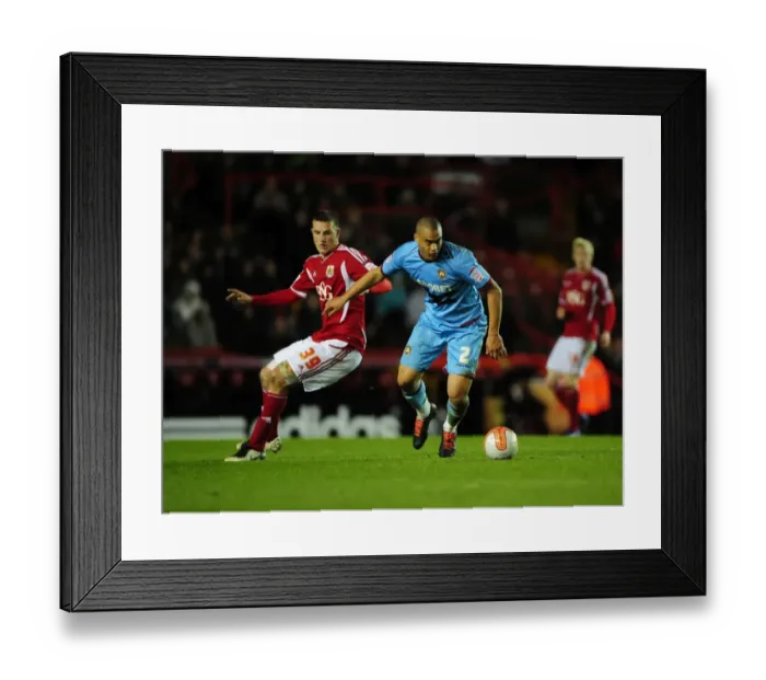 Framed Print : Bristol City vs. West Ham: Chris Wood vs. Winston Reid Battle for Possession Framed Print : Bristol City vs. West Ham: Chris Wood vs. Winston Reid Battle for Possession