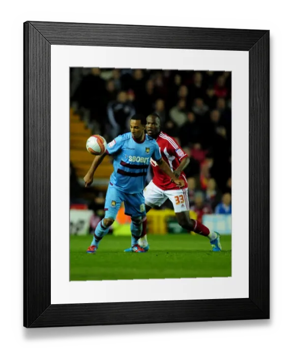 Framed Print : Bristol City vs. West Ham: A Battle for Possession – Amougou vs. Maynard at Ashton Gate Stadium, 2012 Framed Print : Bristol City vs. West Ham: A Battle for Possession – Amougou vs. Maynard at Ashton Gate Stadium, 2012
