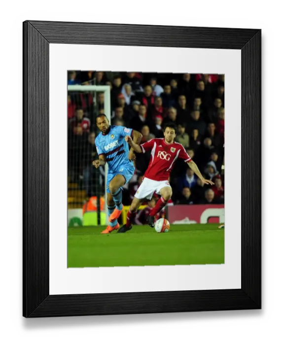 Framed Print : Bristol City's Cole Skuse vs. John Carew: A Football Battle at Ashton Gate Stadium, 2012