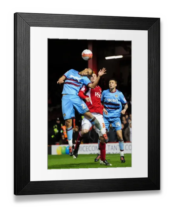 Framed Print : Intense Aerial Battle: Chris Wood vs. Winston Reid, Bristol City vs. West Ham United