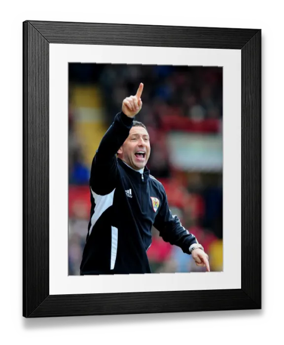 Framed Print : Bristol City FC: Derek McInnes Leads the Charge Against Barnsley at Ashton Gate Stadium, 2012 Framed Print : Bristol City FC: Derek McInnes Leads the Charge Against Barnsley at Ashton Gate Stadium, 2012