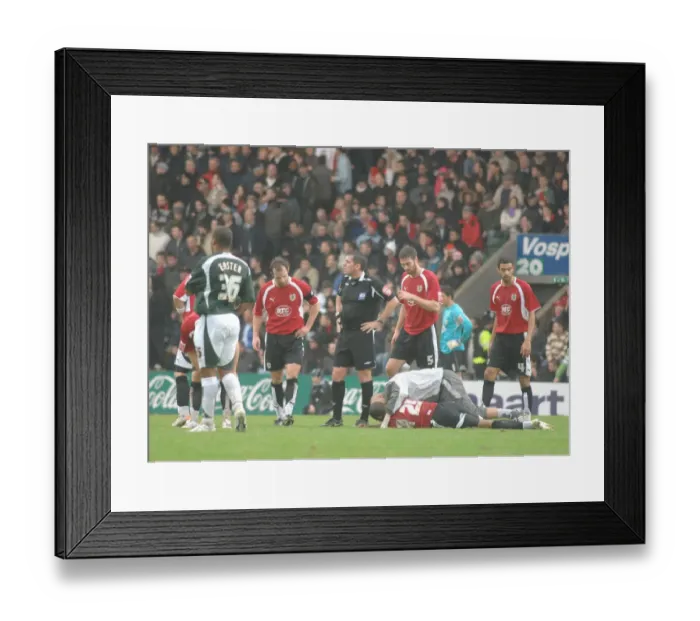 Framed Print : Bristol City FC: Physio in Action during Plymouth Match