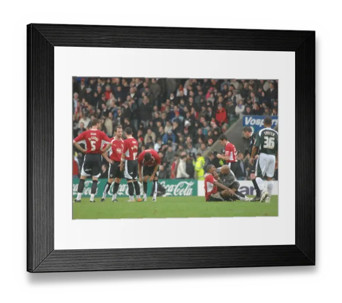 Framed Print : Bristol City FC: Physio at Work during Plymouth Match