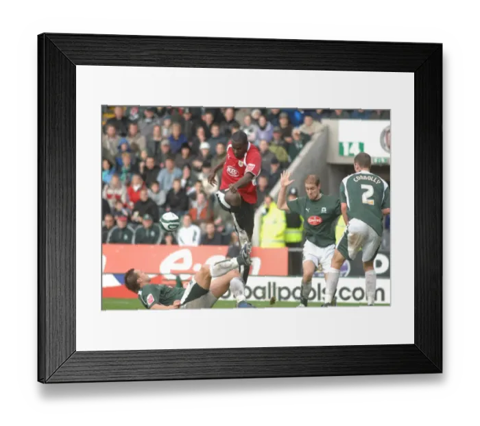 Framed Print : Enoch Showunmi in Action: Plymouth vs. Bristol City - Football Rivalry Framed Print : Enoch Showunmi in Action: Plymouth vs. Bristol City - Football Rivalry