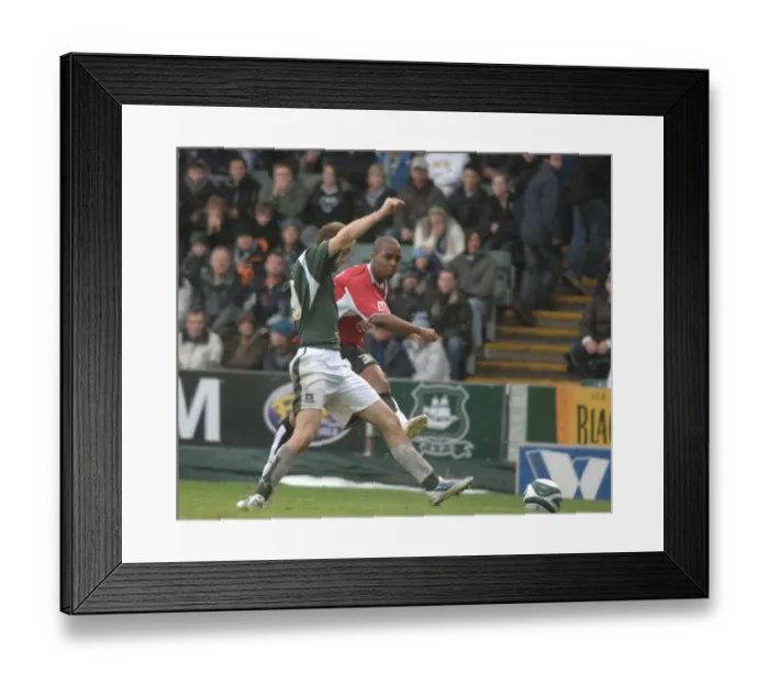 Framed Print : Darren Byfield in Action: Plymouth vs. Bristol City - Intense Rivalry on the Football Field Framed Print : Darren Byfield in Action: Plymouth vs. Bristol City - Intense Rivalry on the Football Field