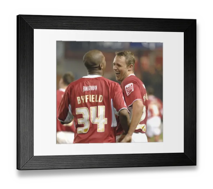 Framed Print : Bristol City's Byfield and Trundle: A Powerful Duo in Action Against Barnsley Framed Print : Bristol City's Byfield and Trundle: A Powerful Duo in Action Against Barnsley