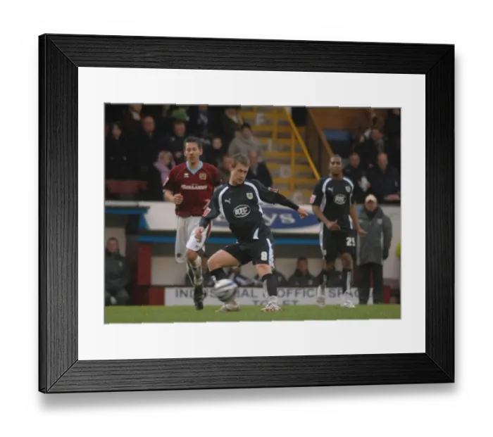 Framed Print : David Noble in Action: Burnley vs. Bristol City Framed Print : David Noble in Action: Burnley vs. Bristol City
