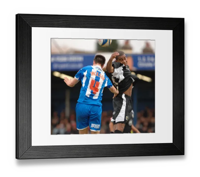 Framed Print : Marvin Elliott: Thrilling Moment at Colchester United vs. Bristol City