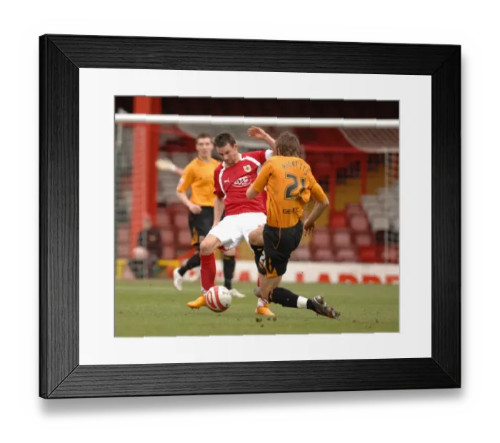 Framed Print : Intense Rivalry: Michael McIndoe in Action - Bristol City vs Hull City Framed Print : Intense Rivalry: Michael McIndoe in Action - Bristol City vs Hull City