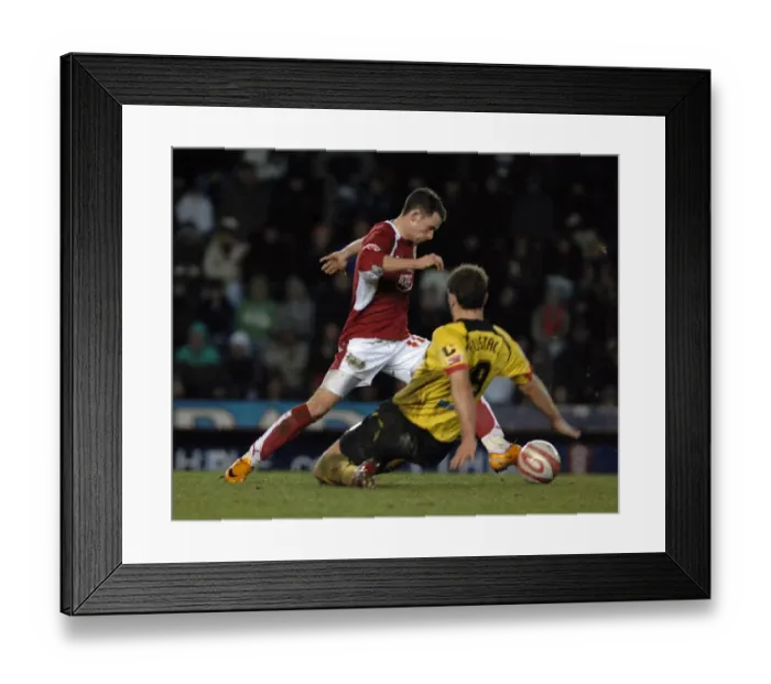 Framed Print : Michael McIndoe in Action: Bristol City vs. Watford - Intense Football Showdown