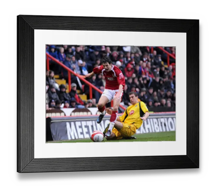 Framed Print : Intense Moment: A Clash Between Sproule and the Action – Bristol City vs Plymouth Argyle