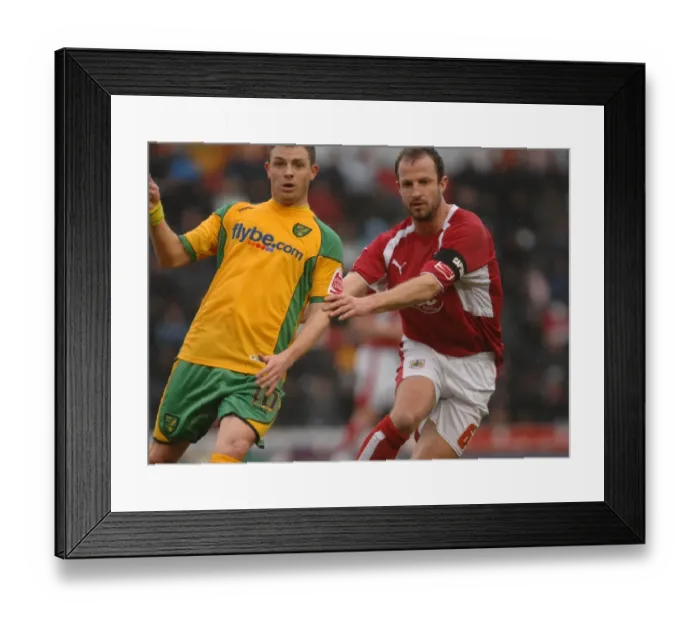 Framed Print : Bristol City: Carey and Cureton Clash in Action Against Norwich City