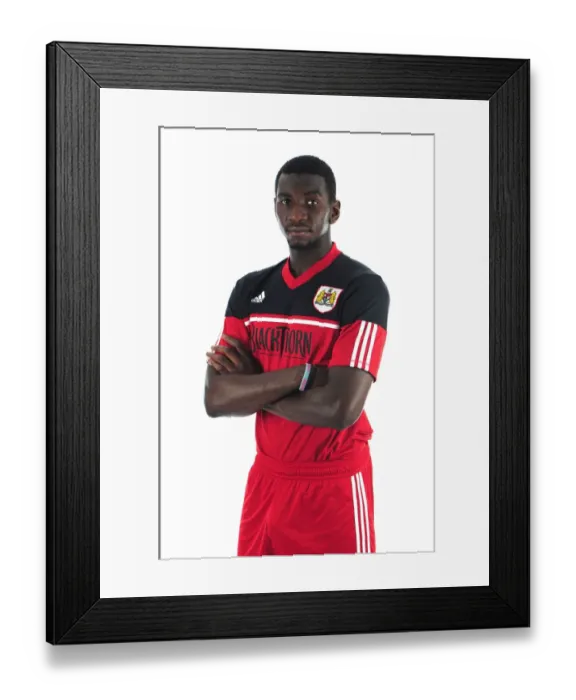 Framed Print : Bristol City's Yannick Bolasie: Intense Concentration during Pre-Season Training Framed Print : Bristol City's Yannick Bolasie: Intense Concentration during Pre-Season Training