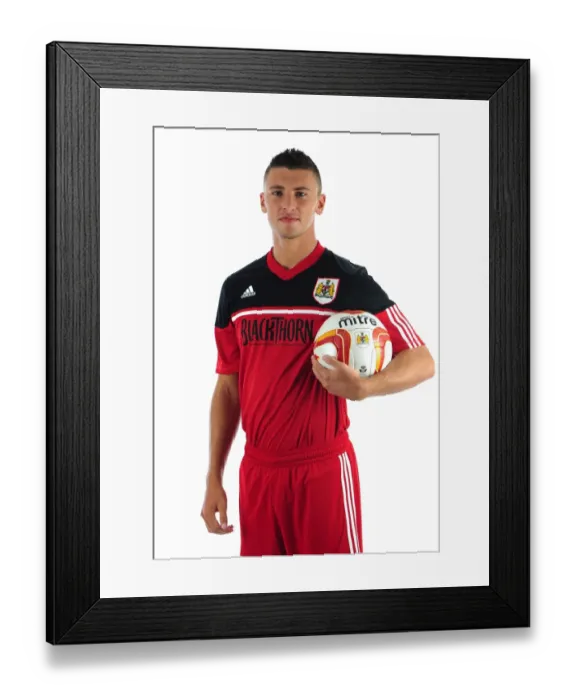 Framed Print : Bristol City FC: James Wilson's Intense Concentration at Ashton Gate Stadium Framed Print : Bristol City FC: James Wilson's Intense Concentration at Ashton Gate Stadium