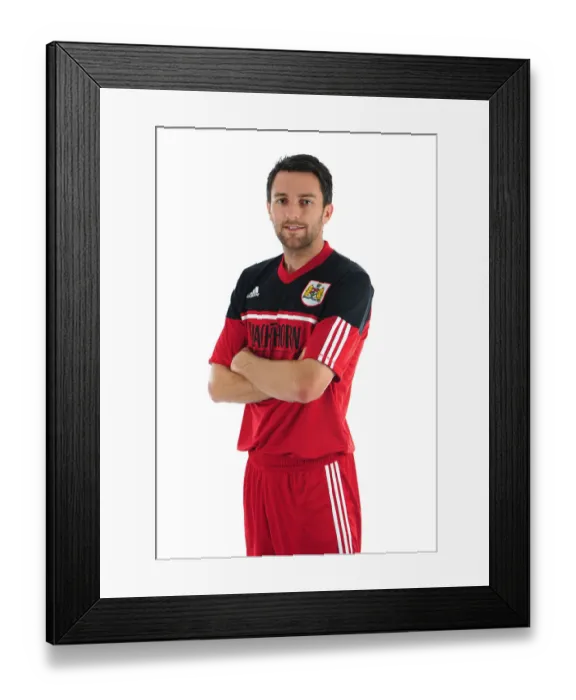 Framed Print : Bristol City Football Club: Cole Skuse's Intense Focus during Pre-Season Training at Ashton Gate Stadium