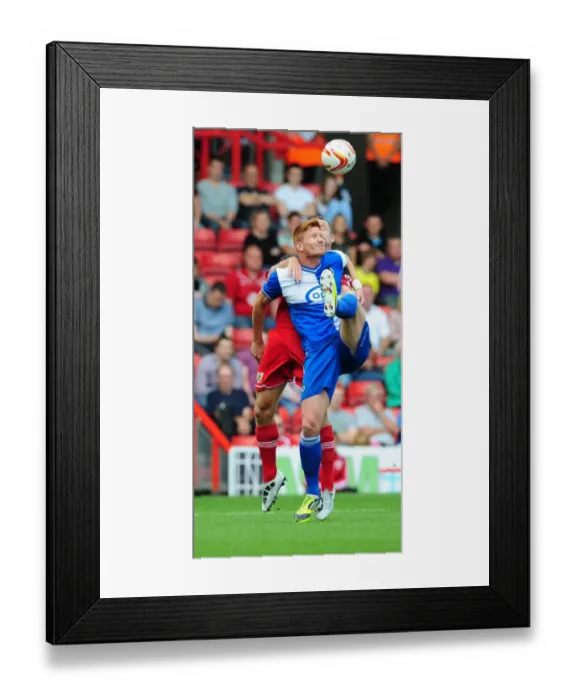 Framed Print : Louis Carey vs Matt Harold: A Battle for Supremacy in the Carey Testimonial Friendly, Bristol City vs Bristol Rovers, August 2012