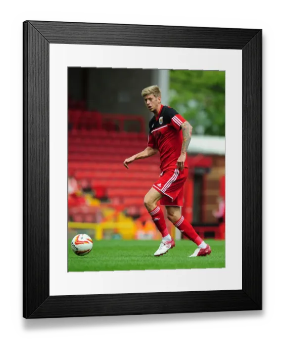 Framed Print : Jon Stead Scores in Louis Carey's Testimonial: A Memorable Moment at Ashton Gate (August 4, 2012)