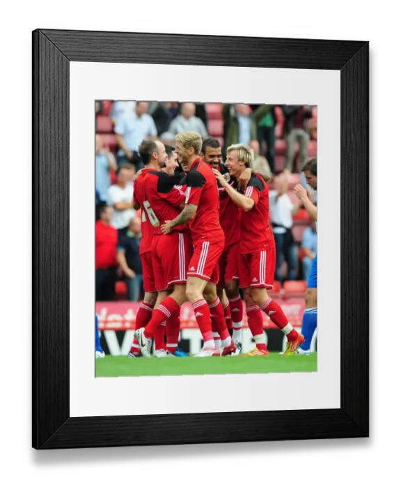 Framed Print : Martyn Woolford Scores the Thriller in Louis Carey's Testimonial Match vs. Bristol Rovers (August 4, 2012) Framed Print : Martyn Woolford Scores the Thriller in Louis Carey's Testimonial Match vs. Bristol Rovers (August 4, 2012)